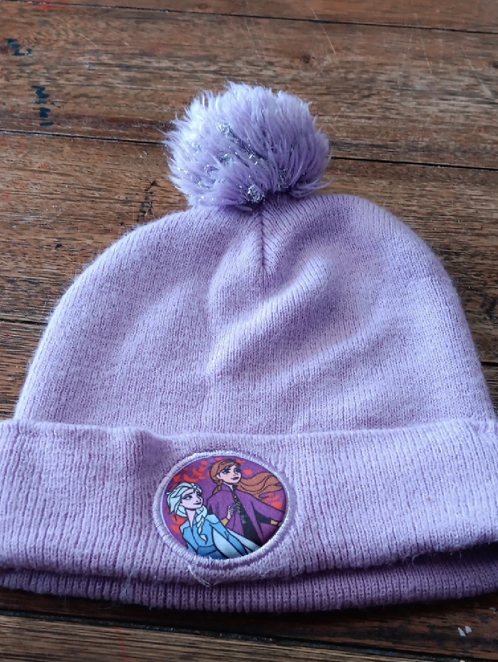 Disney Frozen 2 Kids Purple Pom Beanie Hat with Character Badge